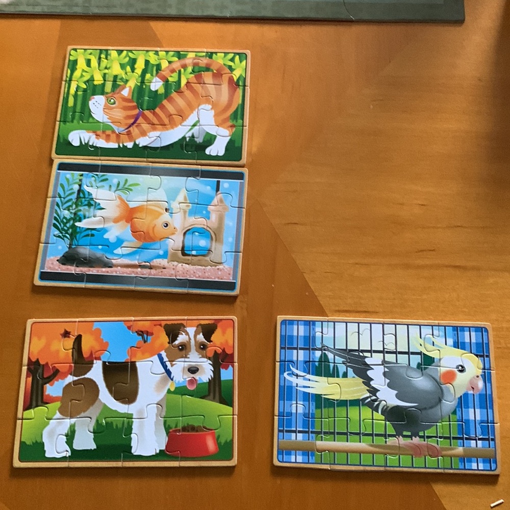 Melissa and Doug four wooden jigsaw puzzles
